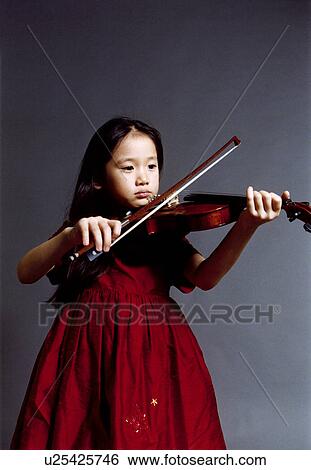 Stock Photograph - Girl playing a violin. Fotosearch