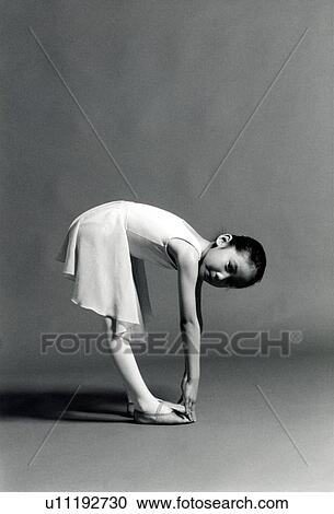 Portrait of a girl exercising View Large Photo Image Stock Image - Portrait of a girl exercising. Fotosearch