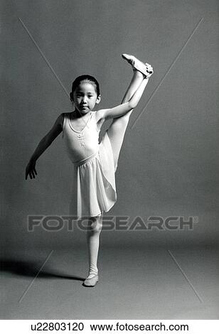 Portrait of a girl exercising View Large Photo Image Stock Image - Portrait of a girl exercising. Fotosearch