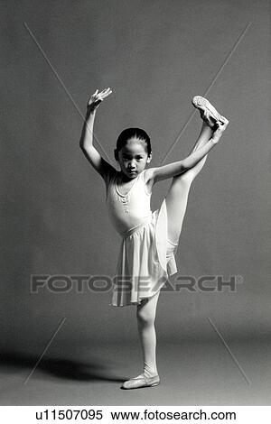 Stock Photography - Portrait of a girl exercising. Fotosearch