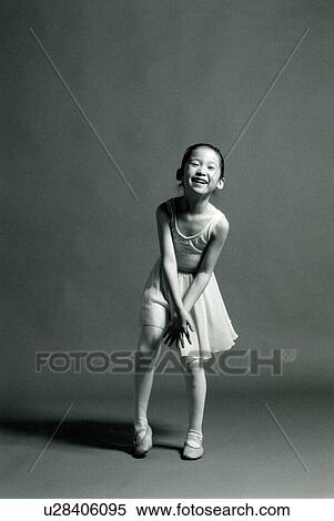 Stock Photography - Portrait of a girl laughing. Fotosearch