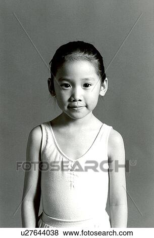 Stock Photo - Portrait of a girl smiling. Fotosearch