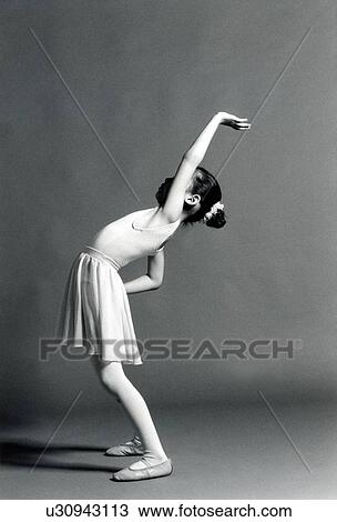 Side profile of a girl exercising View Large Photo Image Stock Image - Side profile of a girl exercising. Fotosearch