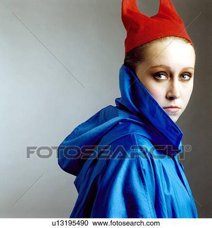Woman in devil costume looking serious View Large Photo Image Stock Image - Woman in devil costume looking serious. Fotosearch