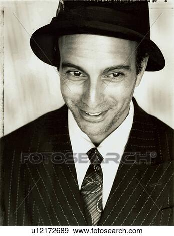 Stock Photo - Close-up of a businessman smiling. Fotosearch