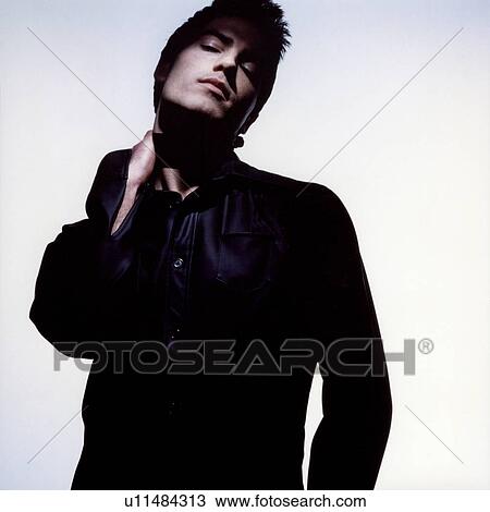 Stock Image - Close-up of a male fashion model posing. Fotosearch