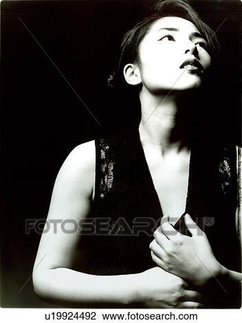 Female fashion model sitting View Large Photo Image Stock Image - Female fashion model sitting. Fotosearch