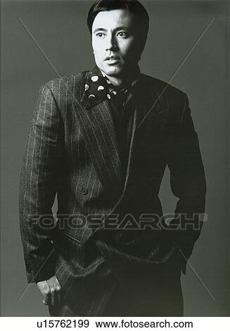 Stock Photo - Male fashion model posing. Fotosearch