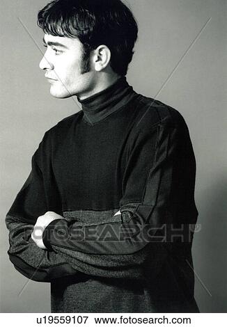 Stock Photo - Rear view of a male fashion model posing. Fotosearch