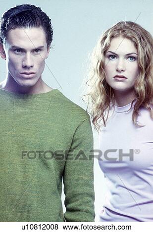 Stock Photo - Two young men sitting together. Fotosearch
