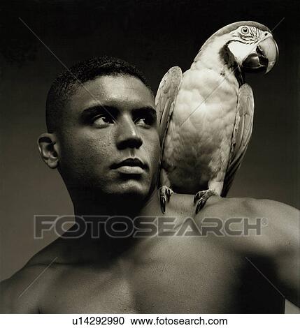 Close-up of a man sticking his tongue out View Large Photo Image Stock Image - Close-up of a man sticking his tongue out. Fotosearch