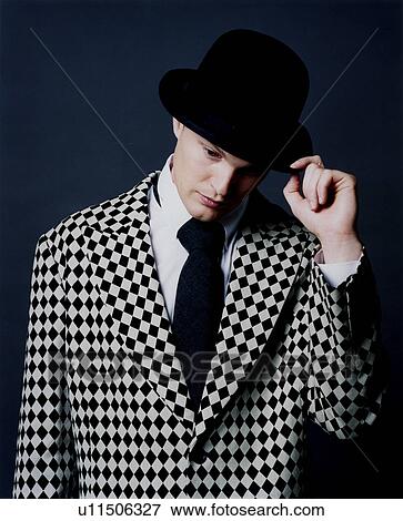 Stock Photo - Close-up of a man thinking. Fotosearch