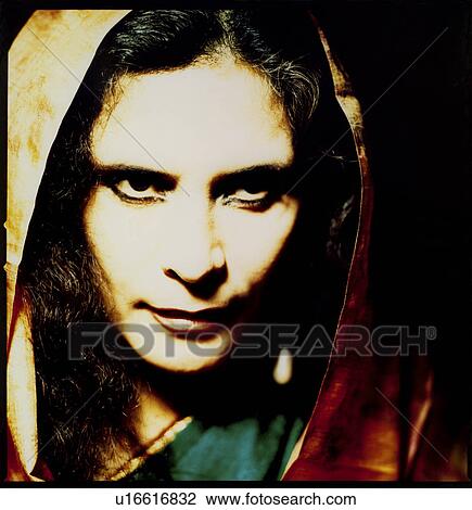 Stock Image - Close-up of a woman thinking. Fotosearch
