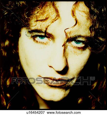 Stock Photo - Close-up of a woman thinking. Fotosearch
