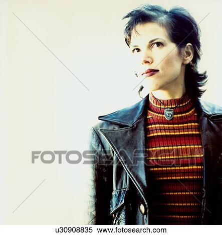 Stock Photography - Close-up of a woman thinking. Fotosearch
