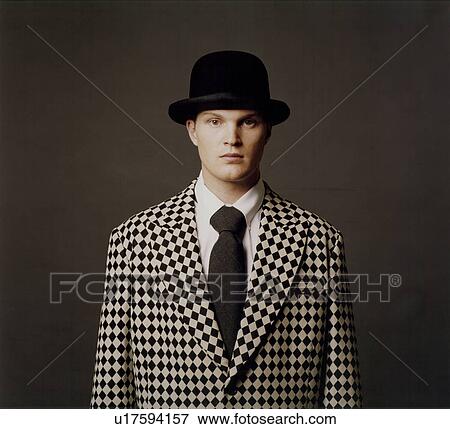 Stock Photo - Man holding a handgun. Fotosearch
