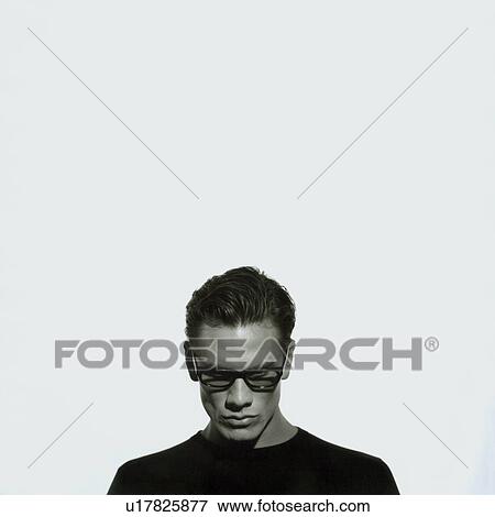 Stock Photo - Portrait of a businessman looking serious. Fotosearch