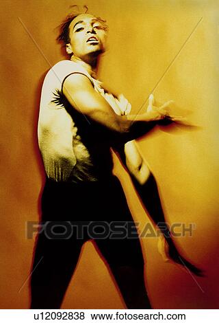 Male dancer practicing in a studio View Large Photo Image Stock Photo - Male dancer practicing in a studio. Fotosearch