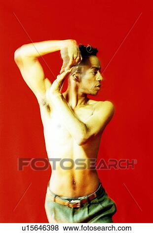 Male dancer practicing in a studio View Large Photo Image Stock Photo - Male dancer practicing in a studio. Fotosearch