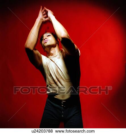 Male dancer practicing in a studio View Large Photo Image Stock Photo - Male dancer practicing in a studio. Fotosearch