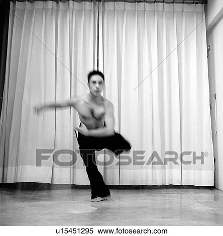 Male dancer practicing in a studio View Large Photo Image Stock Photography - Male dancer practicing in a studio. Fotosearch