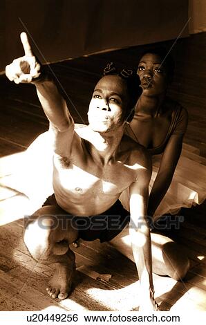 Two ballet dancers practicing in a studio View Large Photo Image Stock Photograph - Two ballet dancers practicing in a studio. Fotosearch