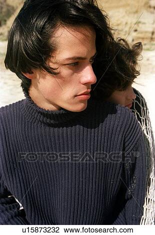 Stock Image - Close-up of a couple romancing. Fotosearch