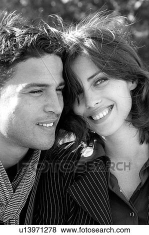 Stock Photo - Close-up of a couple romancing. Fotosearch