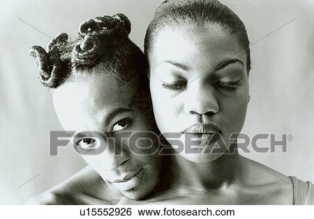 Portrait of a man embracing a woman from behind View Large Photo Image Stock Photograph - Portrait of a man embracing a woman from behind. Fotosearch