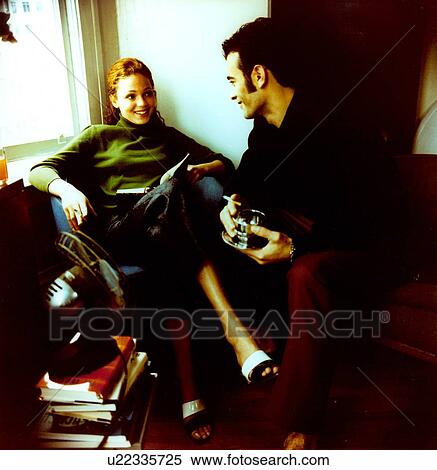 Young couple looking at each other and smiling View Large Photo Image Stock Photography - Young couple looking at each other and smiling. Fotosearch