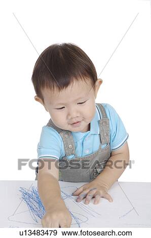 Stock Photo - Two children drawing and playing together. Fotosearch