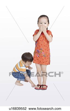 Stock Image - Two children playing together. Fotosearch