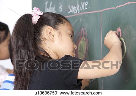 Child, Children drawing on the blackboard View Large Photo Image Stock Photo - Child, Children drawing on the blackboard. Fotosearch