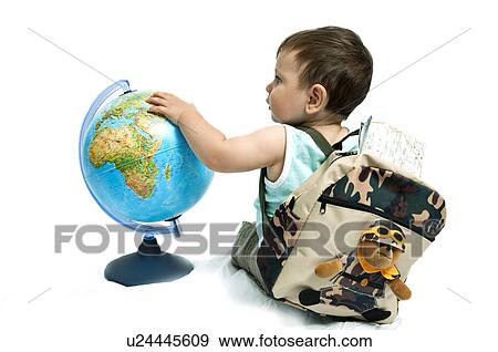 Stock Photo - Baby boy with backpack and globe. Fotosearch