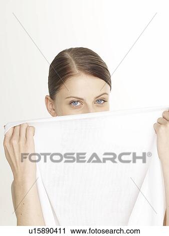 Woman with a white sheet View Large Photo Image Stock Image - Woman with a white sheet. Fotosearch
