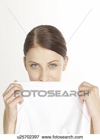 Woman with a white sheet View Large Photo Image Stock Photo - Woman with a white sheet. Fotosearch