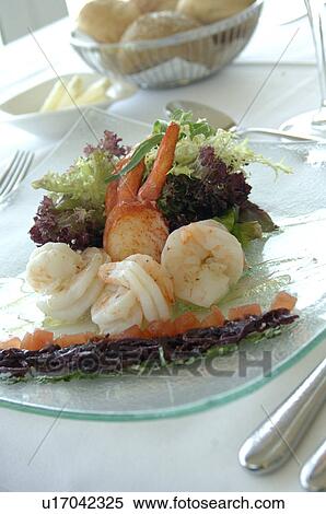 Stock Photography - A dish of lobster, scampi and salad. Fotosearch