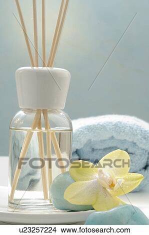 Picture - Small bottle with aroma sticks. Fotosearch