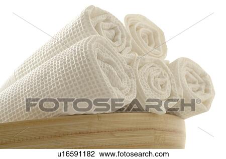 Stock Image - Trundled towels. Fotosearch