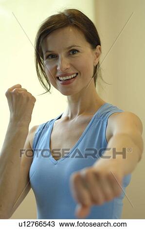 Stock Image - Woman in a sportive dress. Fotosearch