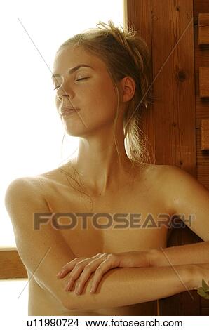 Woman in sauna View Large Photo Image Picture - Woman in sauna. Fotosearch