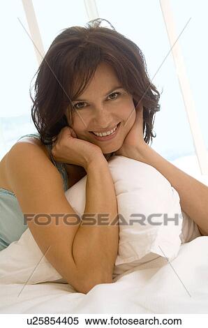Woman with pillow View Large Photo Image Stock Photography - Woman with pillow. Fotosearch