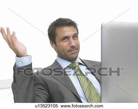 Stock Photography - Business man gesticulating. Fotosearch