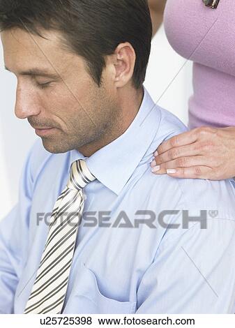 Stock Photo - Business man gets a massage. Fotosearch