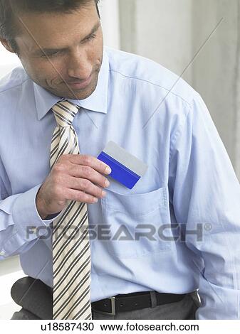 Business man with a credit card View Large Photo Image Stock Image - Business man with a credit card. Fotosearch