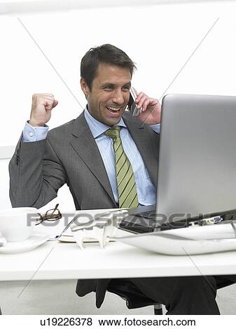 Jubilating business man View Large Photo Image Stock Photo - Jubilating business man. Fotosearch