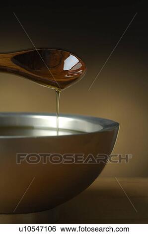 A bowl and a spoon View Large Photo Image Stock Photograph - A bowl and a spoon. Fotosearch