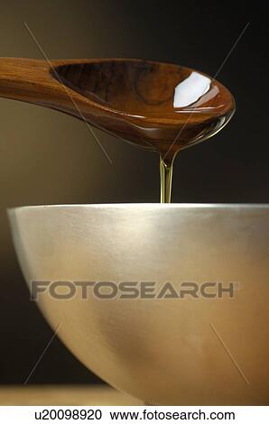 Stock Image - Bowl and a spoon. Fotosearch