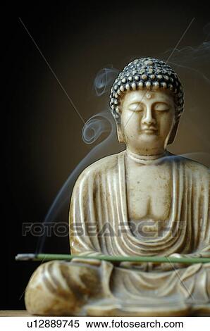 Buddha with a joss stick View Large Photo Image Stock Photography - Buddha with a joss stick. Fotosearch