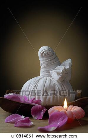 Compress, petals and a candle View Large Photo Image Stock Image - Compress, petals and a candle. Fotosearch